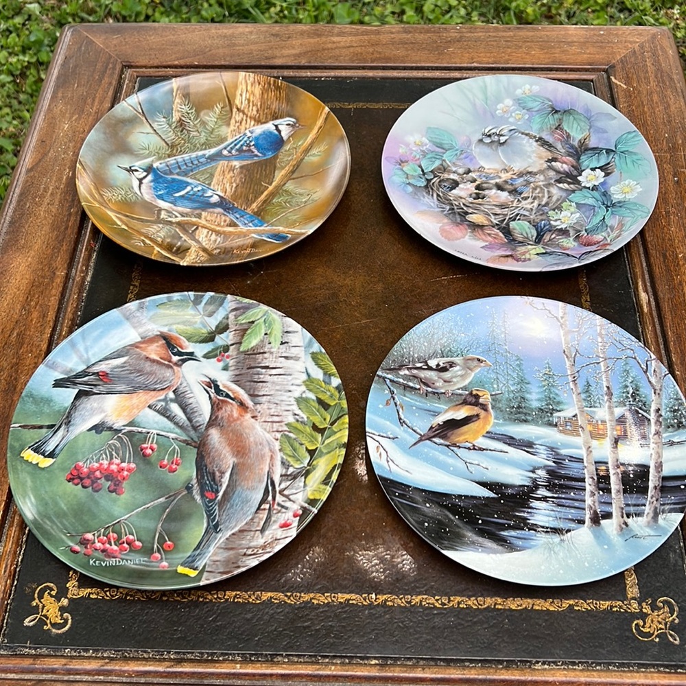 4 collector plates. All dated and numbered